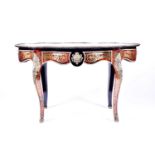A 19th century French ormolu mounted ebonised and inlaid Boulle table the serpentine shaped top