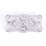 A fine diamond and platinum plaque broochof rectangular form, centred with a collet-set round