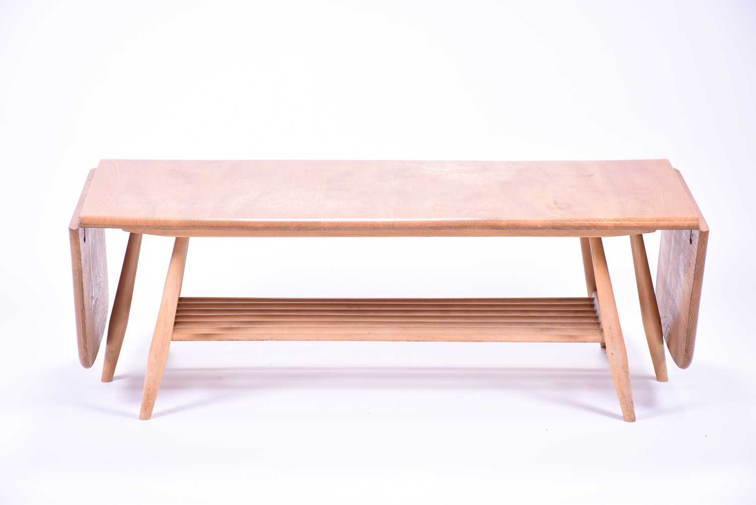 An Ercol extendable coffee table, with a pair of drop flaps and rack below. 108 cm wide, 46 cm deep, - Image 3 of 4