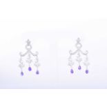 A pair of diamond and amethyst chandelier earringsthe articulated mounts inset with round-cut