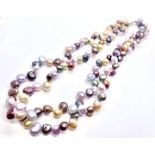 A multi-coloured freshwater pearl necklace with a sterling silver clasp. 42 cm inches long.