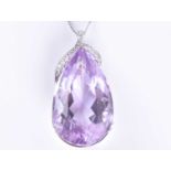 A large 18ct white gold, diamond, and amethyst pendantset with a mixed pear-cut pale purple