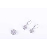 A pair of 14ct white gold and diamond halo earrings9 mm diameter, together with a matching diamond