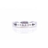 A silver half eternity ringchannel-set to centre with five diamond accents, the shoulders with cut