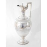 A Victorian silver lidded ewer, Martin, Hall & Co, London 1872, with silver gilt interior, the