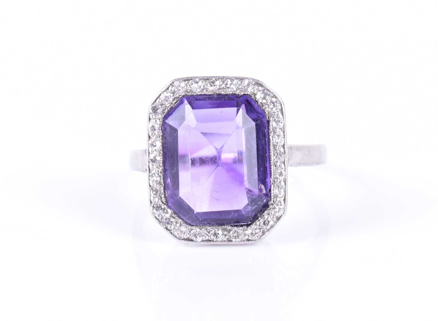 A diamond and amethyst cocktail ringin the Art Deco style, set with an emerald-cut amethyst within - Image 2 of 7