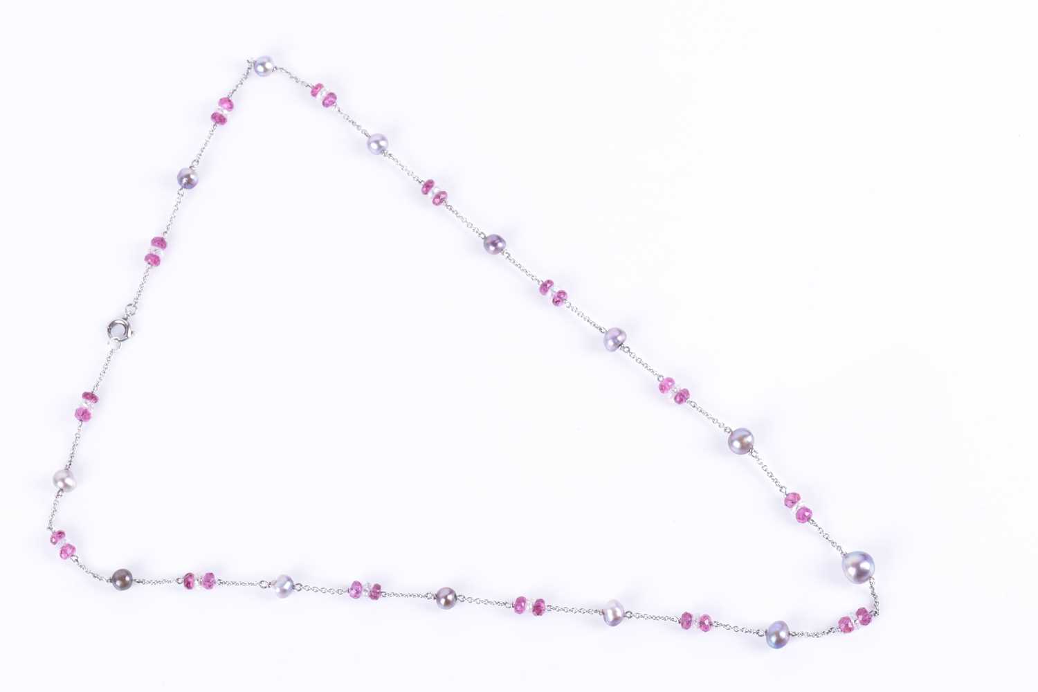 A platinum, diamond, pink tourmaline, and natural saltwater pearl necklace the fine chain