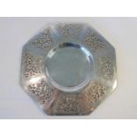 A Continental Arts & Crafts style silver dish, of octagonal form with recessed centre well framed by