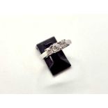 An 18ct white gold 3 stone diamond ring. 3 claw set old cut diamonds of I colour and SI clarity