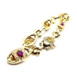 An 18ct yellow gold diamond, ruby, blue and yellow sapphire bracelet. Each section consists of a