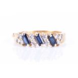 An 18ct yellow gold, diamond, and sapphire ringset with three baguette-cut sapphires and eight