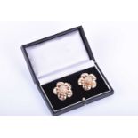 A pair of Van Cleef & Arpels 18ct yellow gold and diamond earringsof floral design, the centre