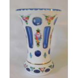 A Bohemian overlaid glass vase, 20th century, with flaring rim and tapering body, the blue glass