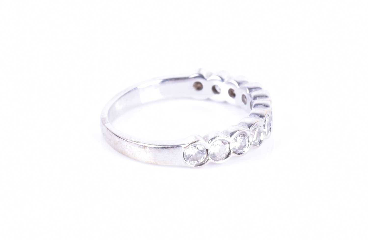 A diamond half-eternity ringbezel-set with eleven round brilliant-cut diamonds of approximately 1.10 - Image 3 of 6