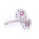 An impressive diamond and ruby floral broochcirca early to mid 20th century, each flower centred