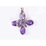 A mid to late Victorian amethyst and diamond cross pendantset with a mixed round-cut amethyst and