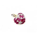 An18ct yellow gold ruby and diamond heart pendant, oval rubies of good colour surrounded by diamonds