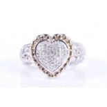 An unusual silver and diamond ringthe heart-shaped mount set with diamonds, within a rope-twist