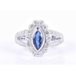 An 18ct white gold, diamond, and sapphire ringset with a marquise-cut blue sapphire of approximately