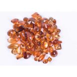 A group lot of loose citrinesvarious cuts and sizes, approximately 100 carats combined. Please note: