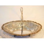 A Victorian silver bread basket, John Rodgers & Sons, Sheffield 1898, of oval form decorated with