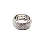 An 18ct white gold full diamond band. Diamonds weighing a total of approximately 7.00 carats. 9.7