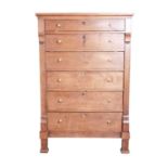 A 19th century oak tall chest of drawers, comprising six graduated drawers with brass handled, and