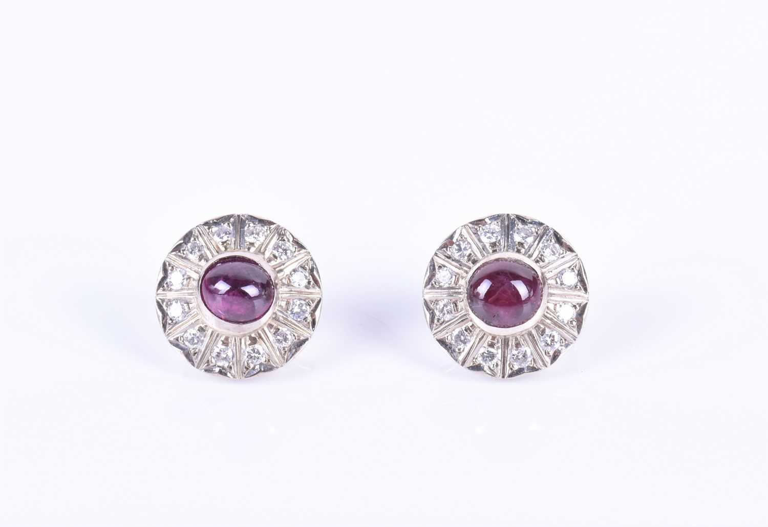 A pair of early to mid 20th century Continental ruby and diamond earringseach centred with a