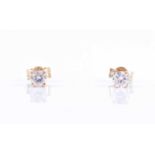 A pair of solitaire diamond ear studsthe round brilliant-cut diamonds of approximately 0.40 carats