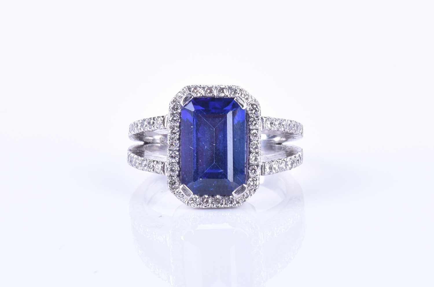 An 18ct white gold, diamond, and tanzanite ringset with an emerald-cut tanzanite, measuring - Image 2 of 5