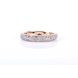 A 14ct yellow gold and diamond half eternity ring, pave-set with round brilliant-cut diamonds,