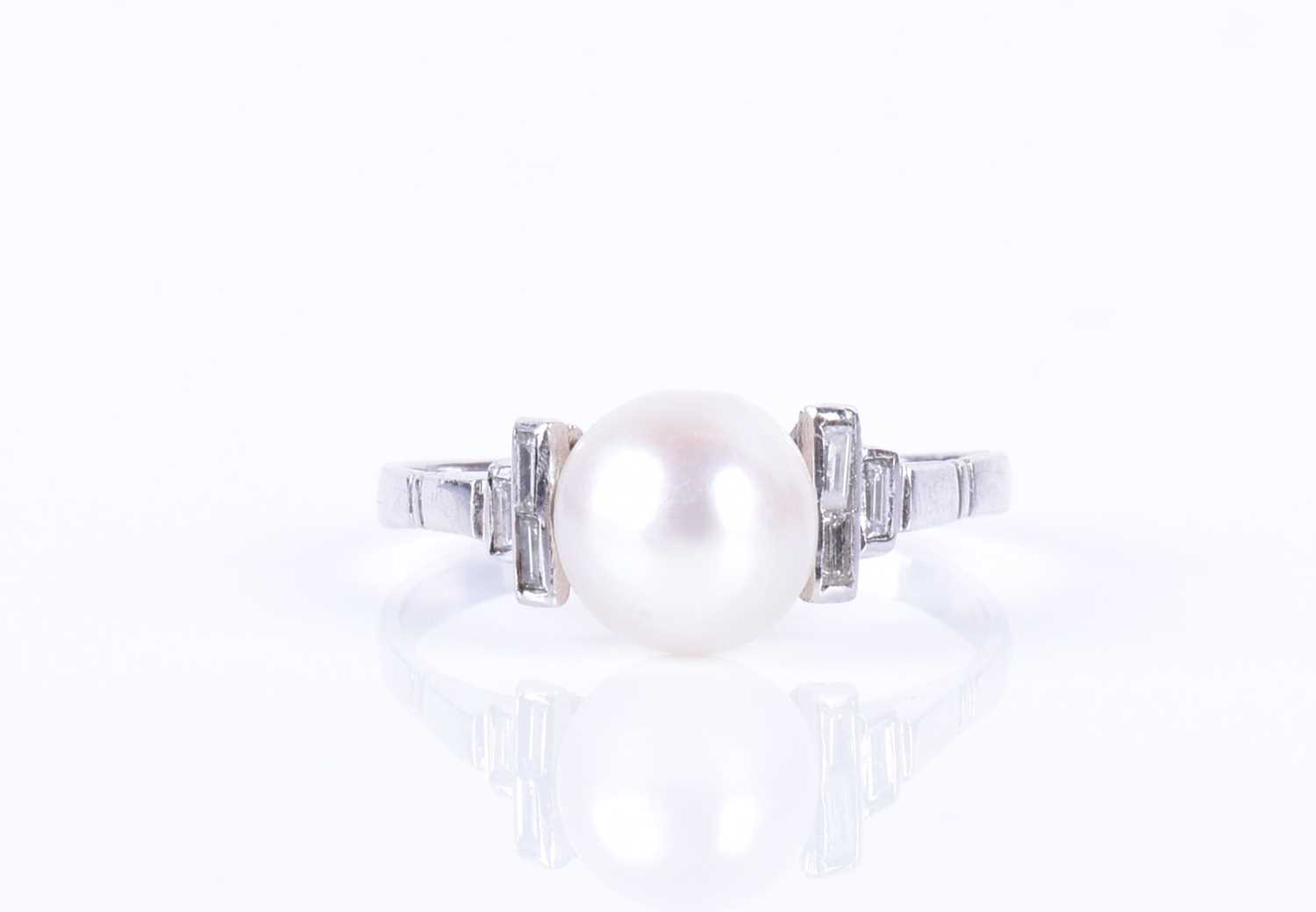 A natural pearl and diamond ringset with a round natural white pearl, measuring approximately 7.5