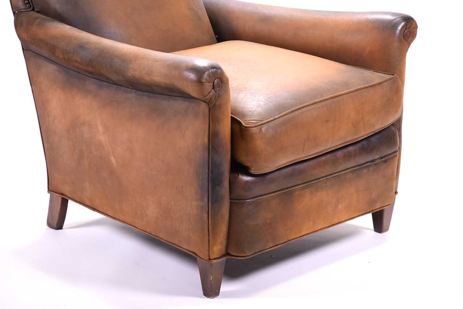 A tan leather club armchair with padded seat and curved armrests, with loose fitted cushion and - Image 2 of 7