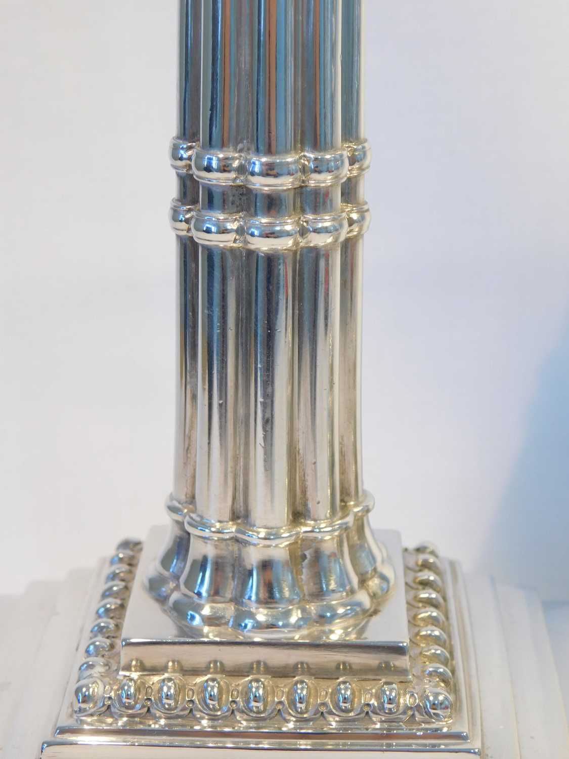 A good pair of early George III silver candlesticks, Ebenezer Coker, London 1770, the gadrooned - Image 8 of 12