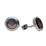 Jacob & Co. A fine pair of stainless steel and diamond 'Rotor' cufflinks, set with 0.21 carats of