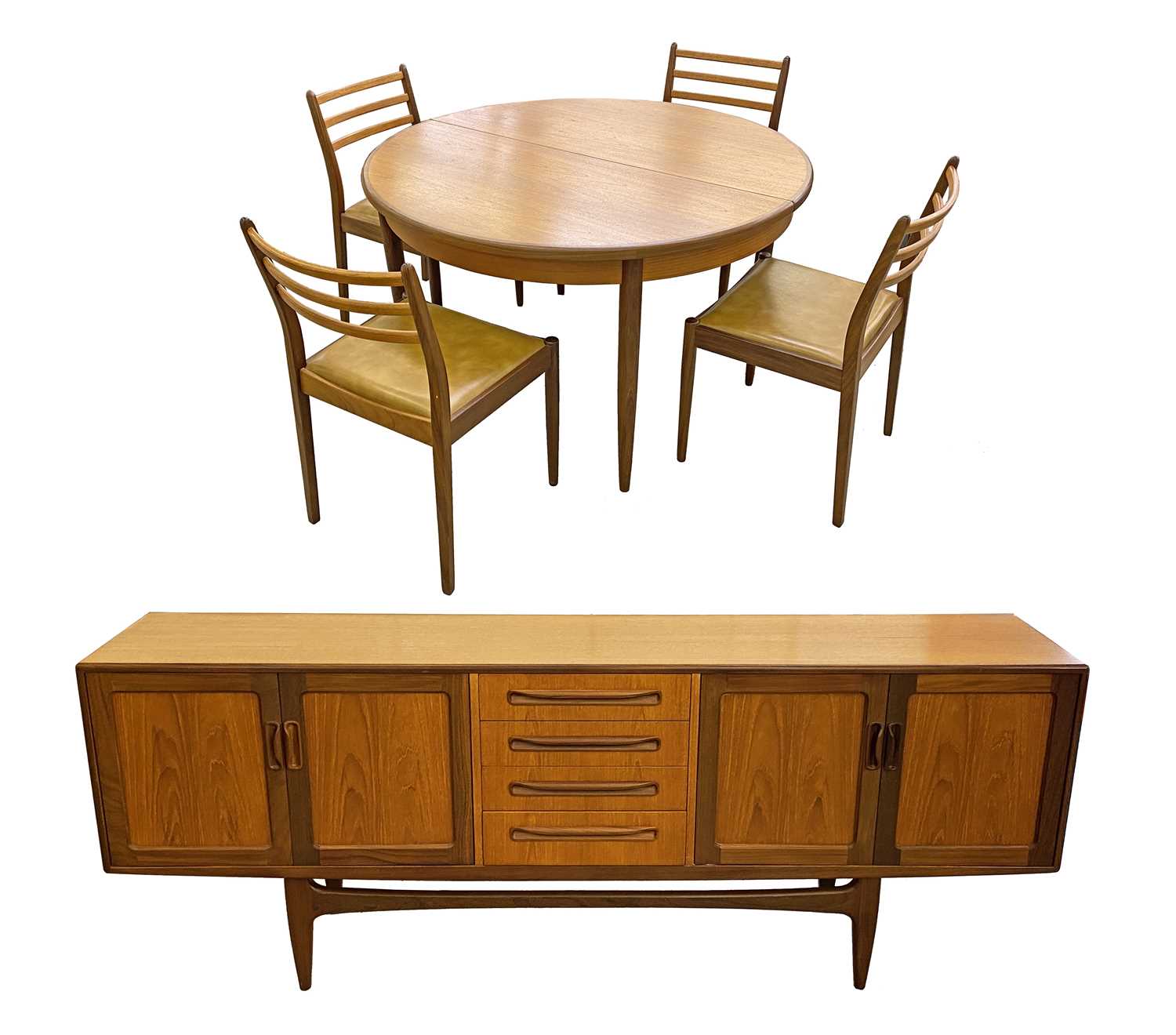 A G-Plan dining suite comprising table, four chairs, and a sideboard, the extending table with