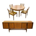 A G-Plan dining suite comprising table, four chairs, and a sideboard, the extending table with