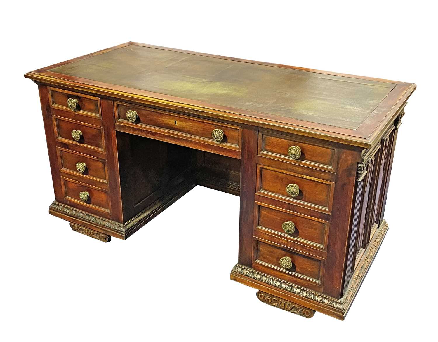 A mahogany pedestal desk, the green leather top over three frieze drawers, and three frieze