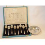 A set of eight 'British Hallmarks' silver teaspoons, Roberts & Belk, London, Birmingham, Sheffield &