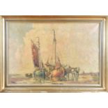 Early 20th century Continental School - possibly Polish a scene of fishing boats on the beach,