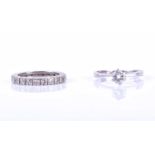 A solitaire diamond ring, set with a round brilliant-cut diamond of approximately 0.45 carats,