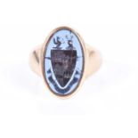 A late 19th / early 20th century 18ct yellow gold intaglio ringthe engraved onyx plaque bearing