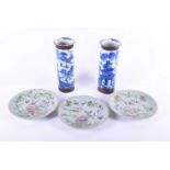 A set of three 19th century Chinese famille rose dishes, decorated with birds, butterflies and