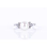 A natural pearl and diamond ringset with a round natural white pearl, measuring approximately 7.5