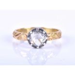 An 18ct yellow gold and rose-cut diamond ring, set with a round rose-cut diamond of approximately