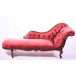 A Victorian walnut framed chaise longuewith button scrolled back on short cabriole legs, 190cm