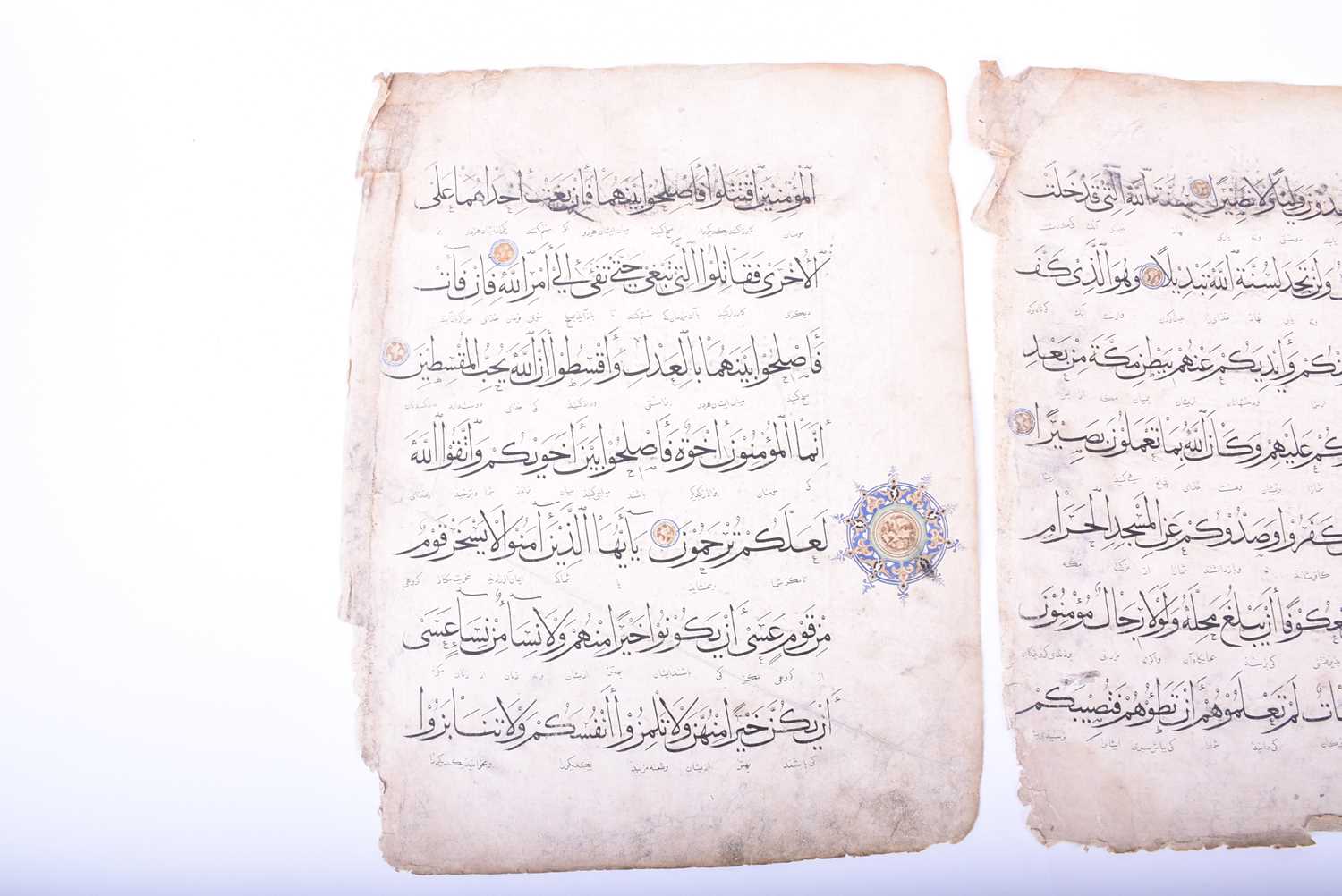 Two leaves of Persian script, 18th century, each with illuminated roundels, 40.5cm x 31cmCondition - Image 4 of 18