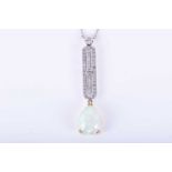 A diamond and opal drop pendant necklacein the Art Deco style, set with a pear-shaped cabochon