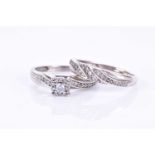 A white gold and diamond cluster engagement ringillusion-set with a round cluster of round