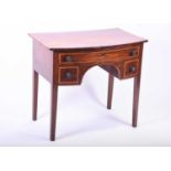 A Georgian mahogany bow front side table the well figured top with satinwood crossbanding, above one